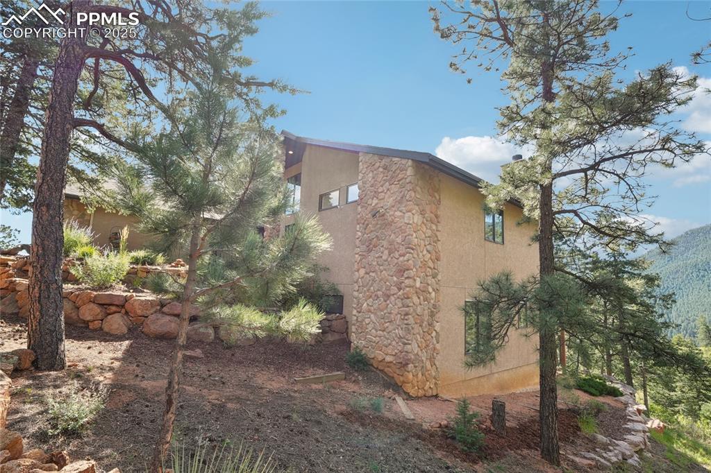 Image 46 of 50: Side yard of home