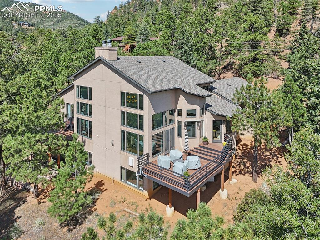 Image 48 of 50: Ariel view of the back of the home