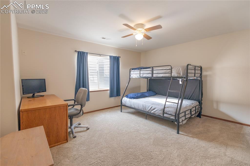 Image 21 of 36: Bedroom