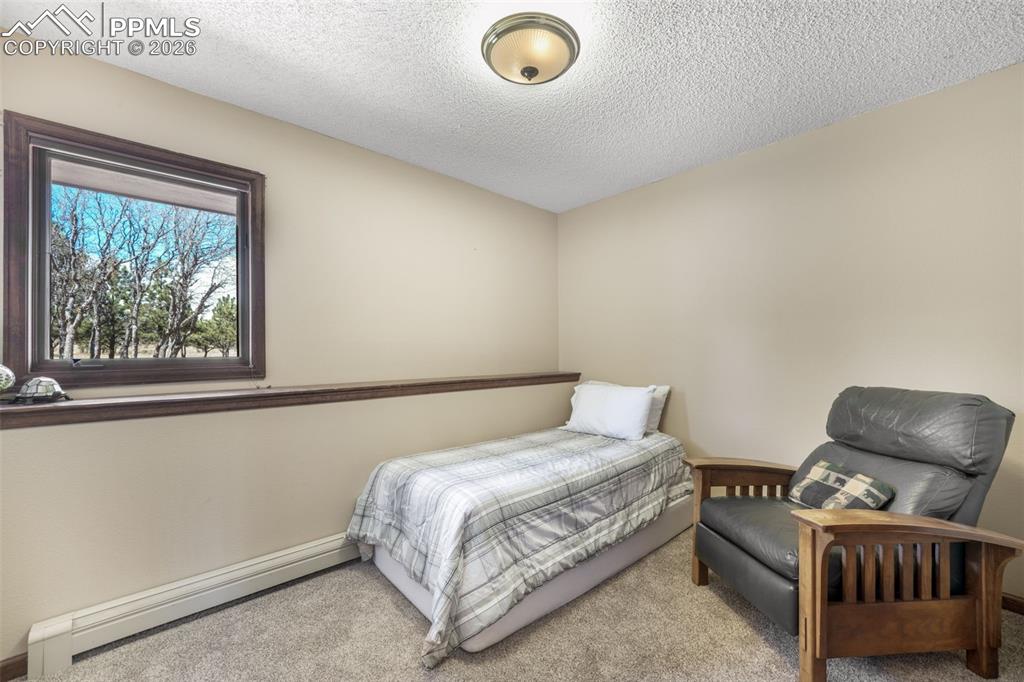 Image 21 of 50: Bedroom