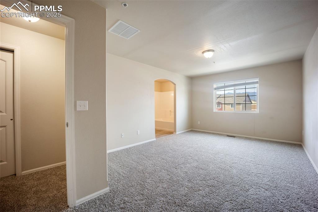 Image 16 of 50: Master Bedroom