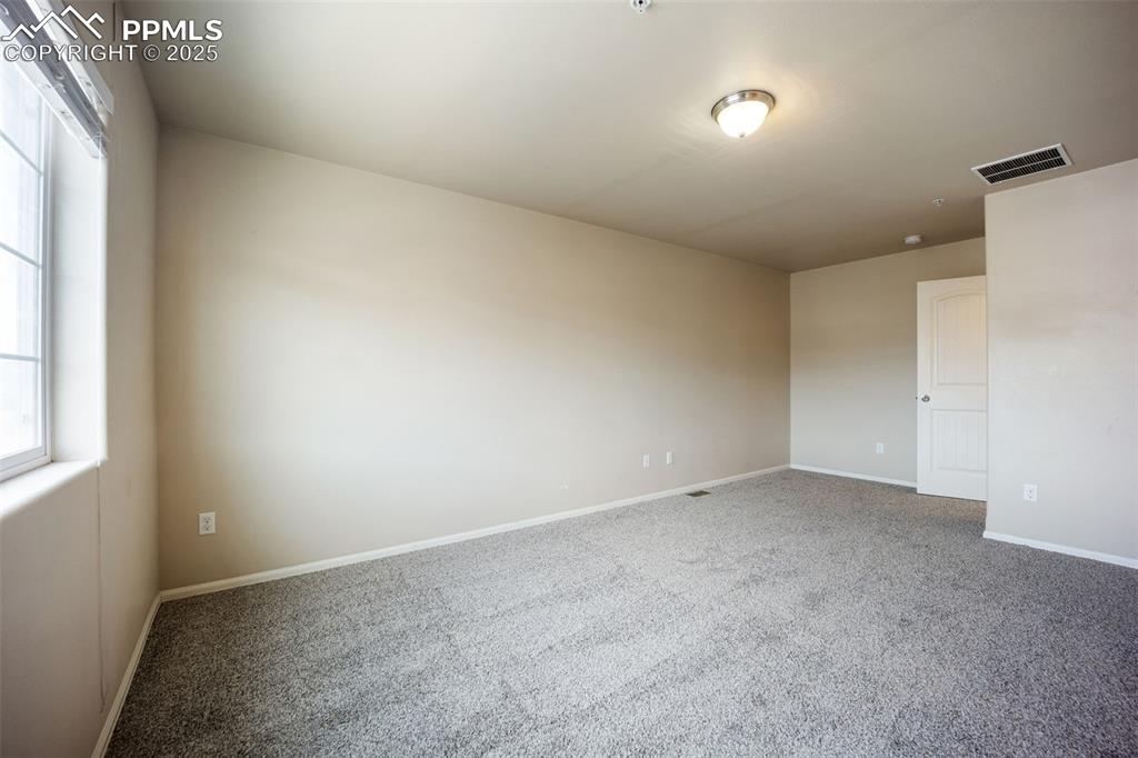 Image 17 of 50: Master Bedroom