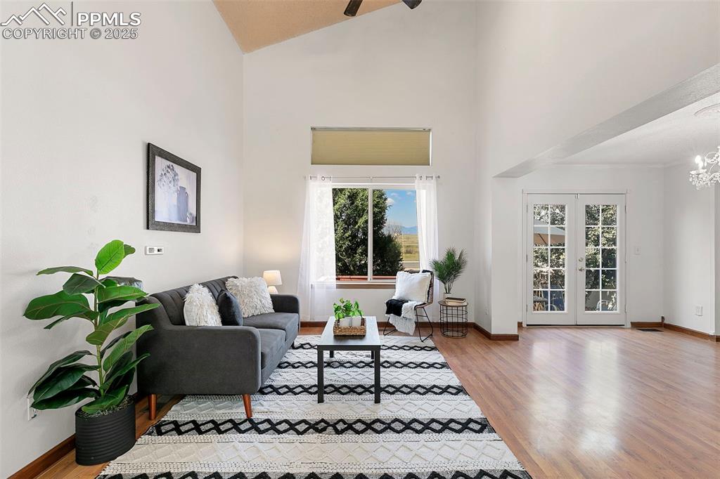 Image 12 of 29: Family Room featuring bright natural lighting and open layout to dining are