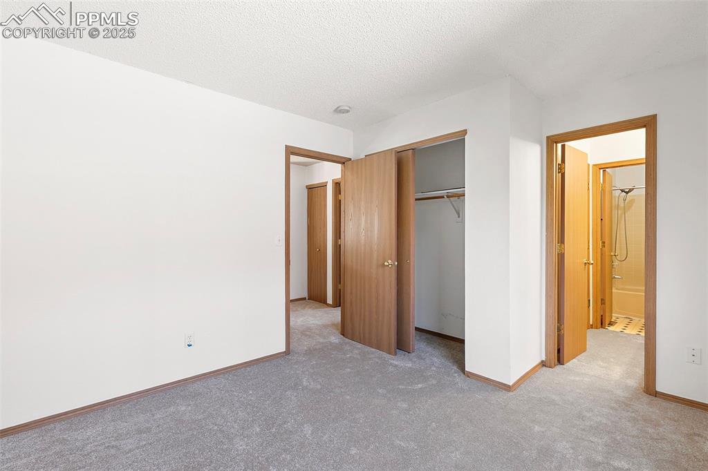 Image 23 of 29: Additional upstairs bedroom with access to jack-and-jill bathroom