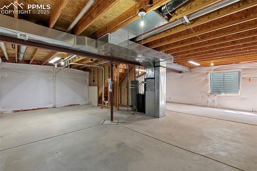 Image 27 of 29: Unfinished basement