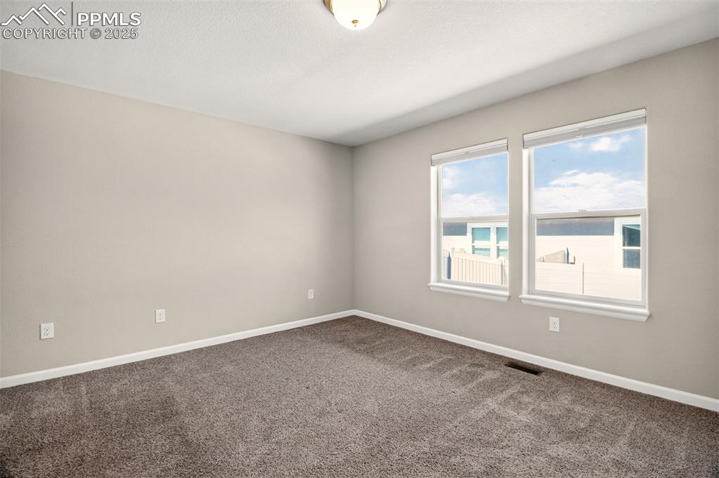 Image 13 of 39: Primary bedroom