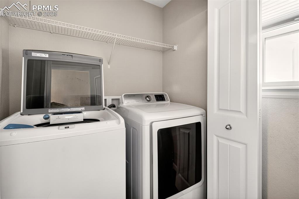 Image 17 of 39: Laundry closet on main level
