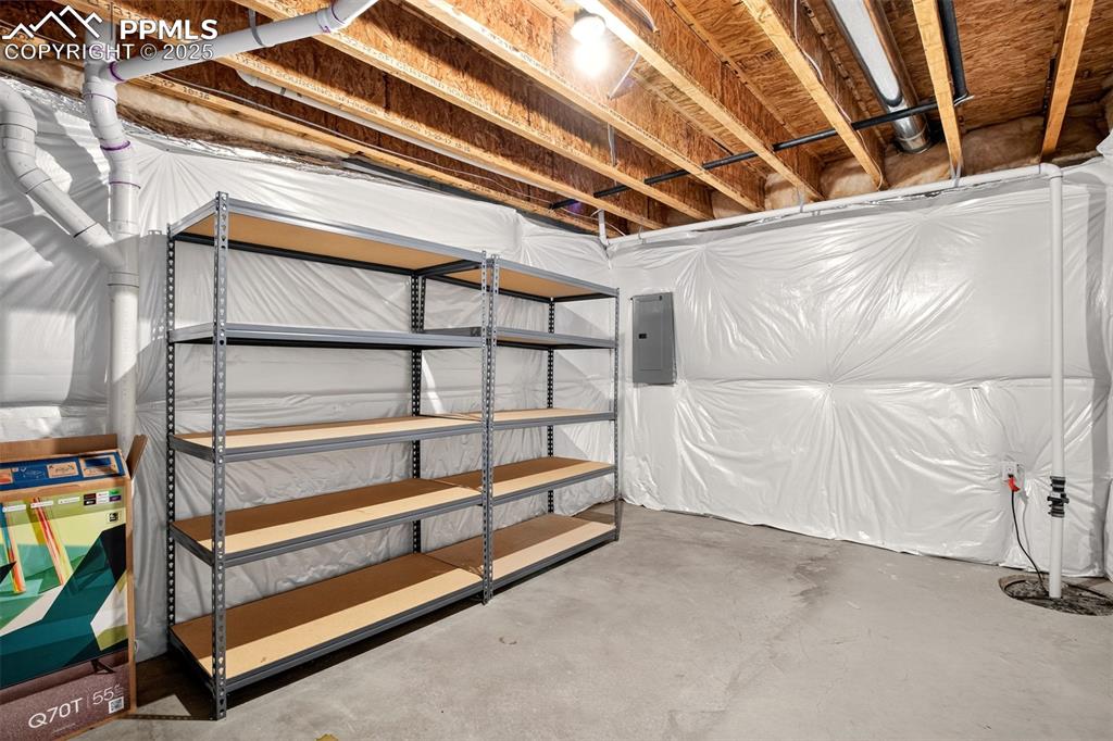 Image 24 of 39: Storage room off recreation room