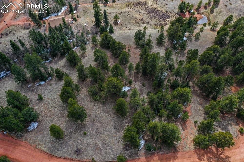 Image 26 of 39: Aerial view featuring a rural view and view of desert