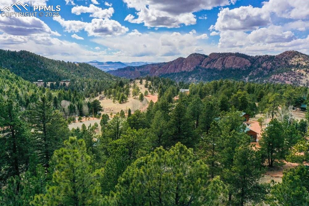 Image 6 of 39: View of mountain feature featuring a view of trees