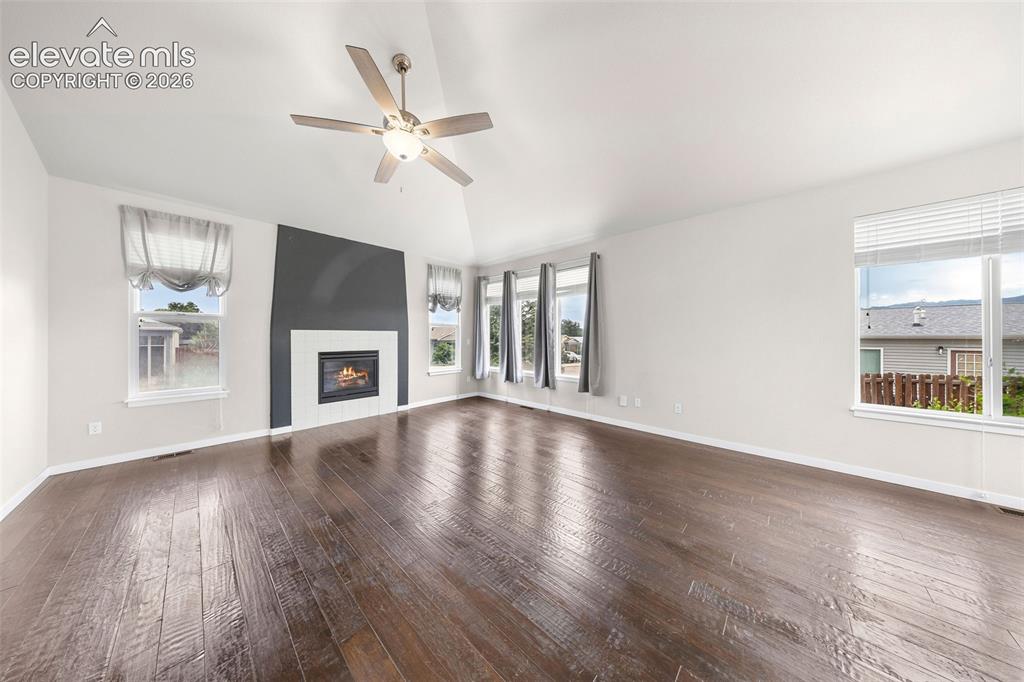 Image 11 of 39: *virtually staged photo featuring beautiful kitchen featuring rich dark woo