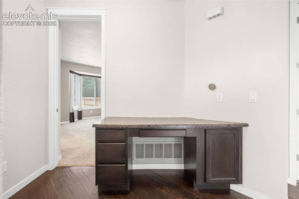 Image 19 of 39: Primary bathroom featuring a built-in Jacuzzi® soaking tub, glass-enclosed