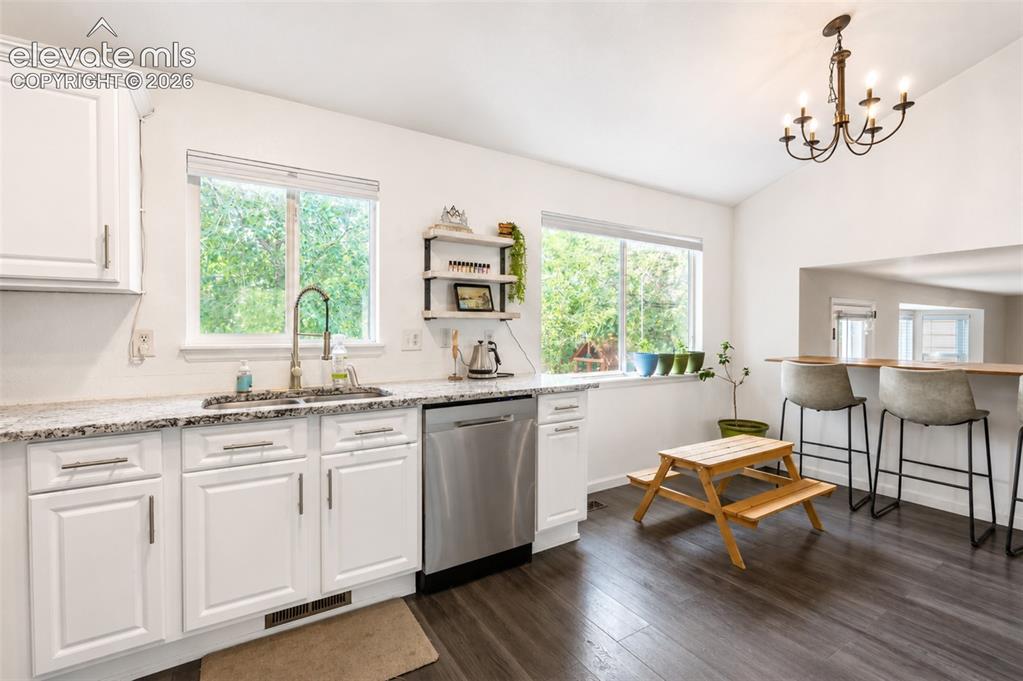 Image 10 of 49: Kitchen - main floor