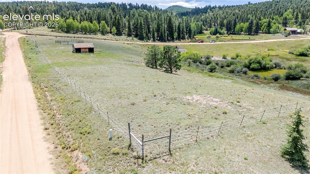 Image 26 of 35: Extensive open land with room to build your dream mountain home on.
