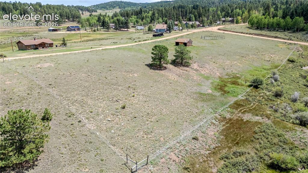 Image 27 of 35: Expansive open land with natural ground cover