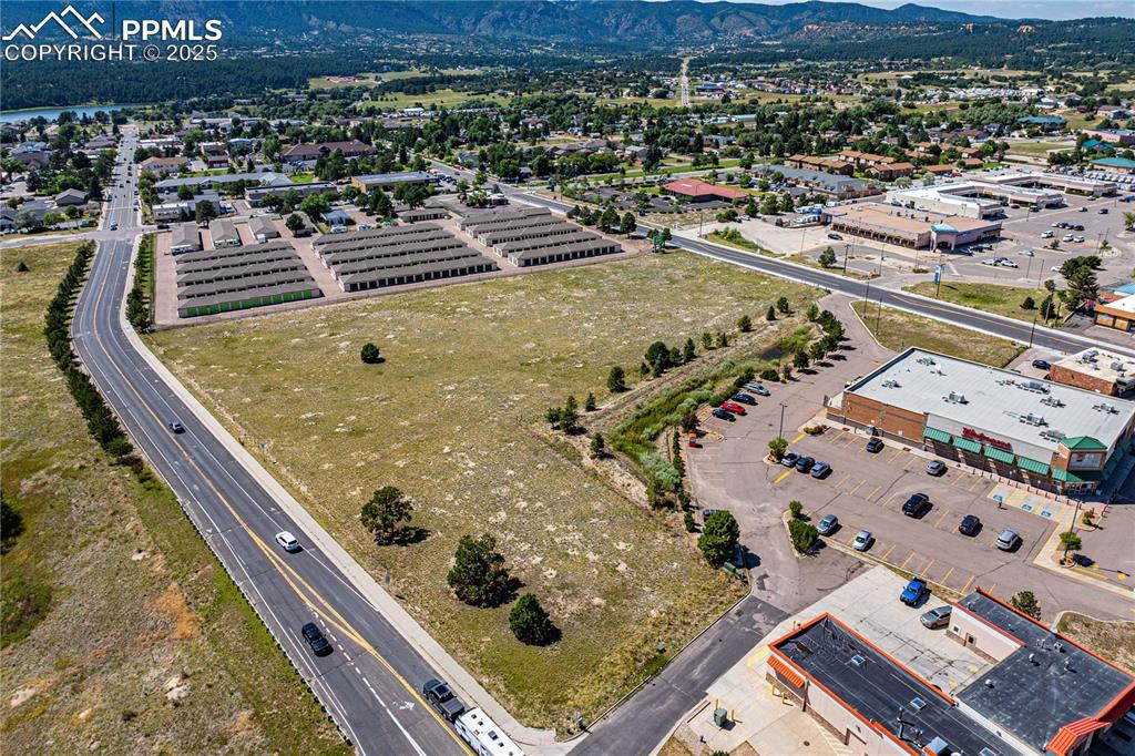 Image 12 of 13: Looking northwest across Lot A from the I-25 and Second St interchange. 