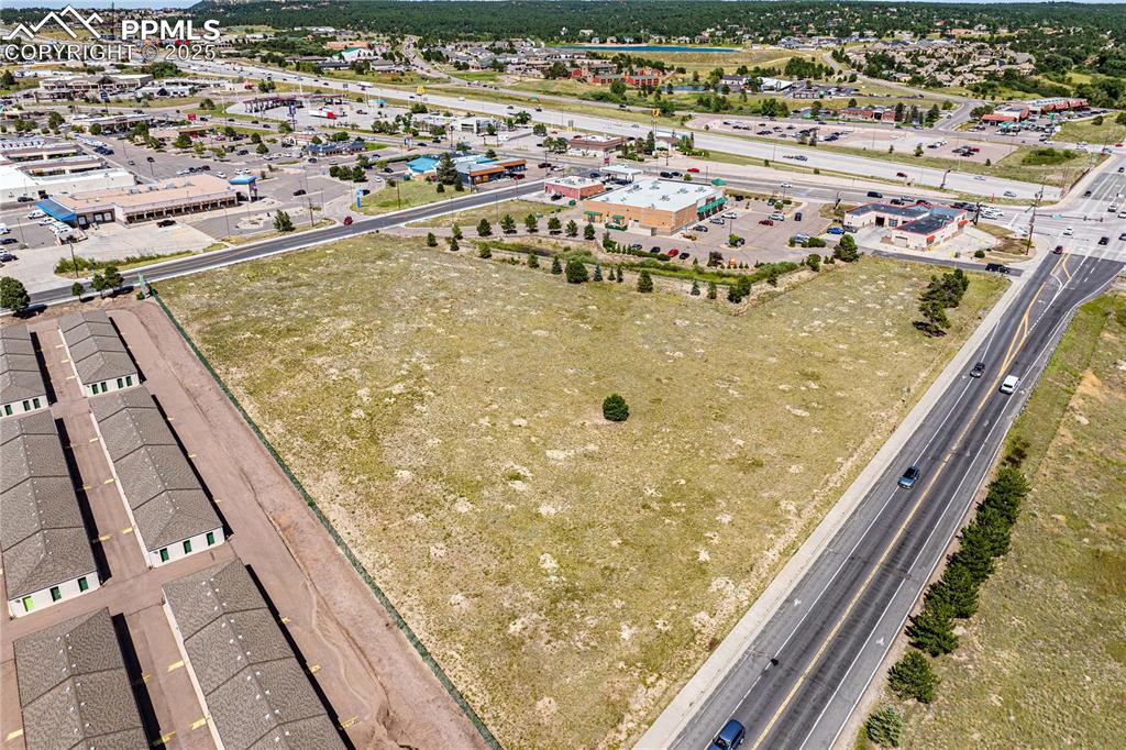 Image 13 of 13: Looking to the northeast across Lot A with Colorado Hwy 105 and I25 running