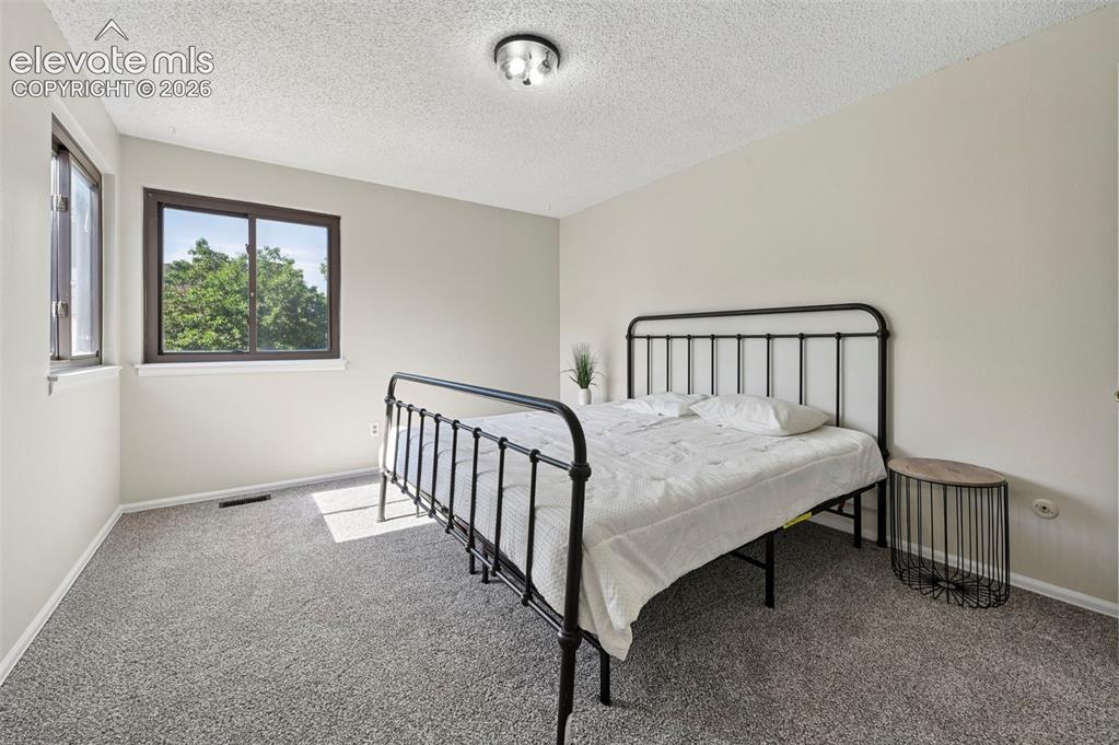 Image 9 of 18: Primary Bedroom 