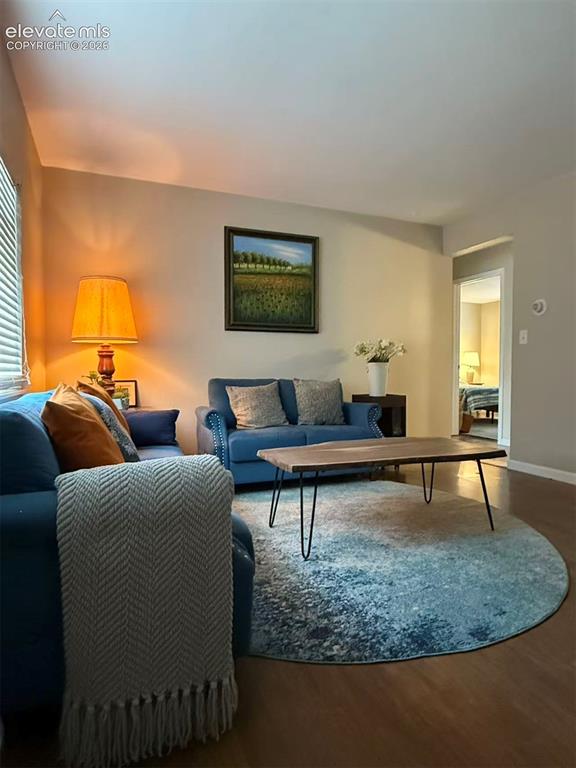 Image 8 of 11: Wood-finish flooring throughout