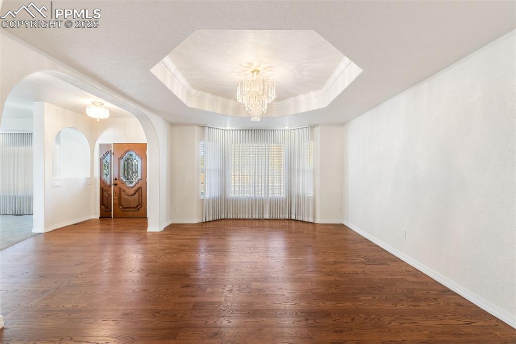 Image 11 of 50: Dining room and entry