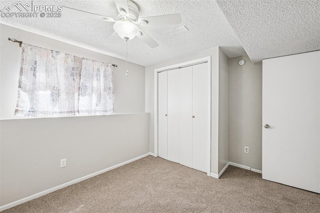 Image 33 of 44: Second Lower Level bedroom, new paint