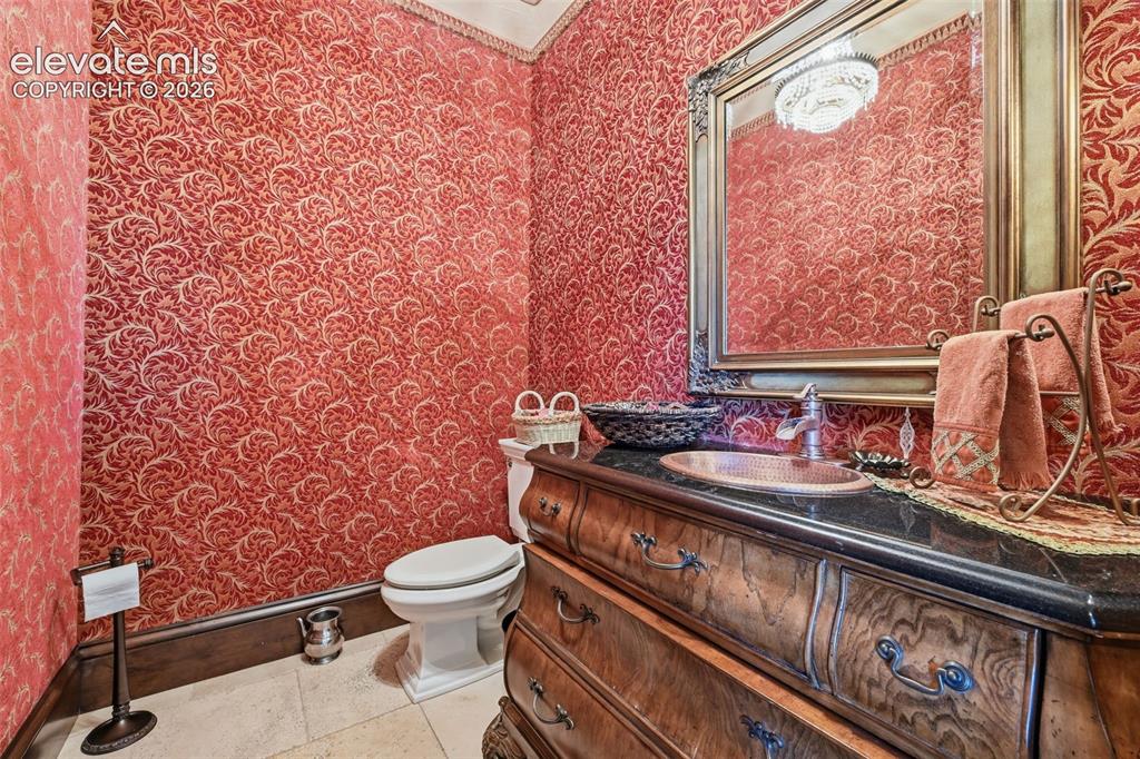 Image 15 of 49: Half bath on main level.