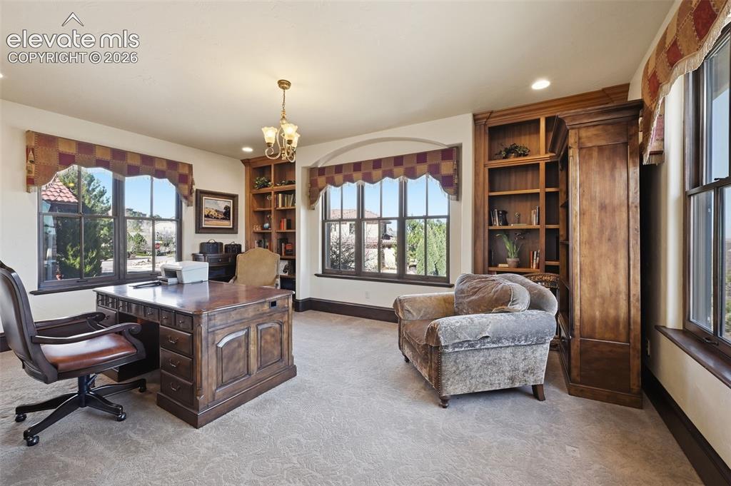 Image 17 of 49: has door to primary bedroom and exterior hall.