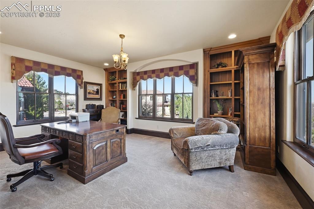 Image 19 of 49: has door to primary bedroom and exterior hall.