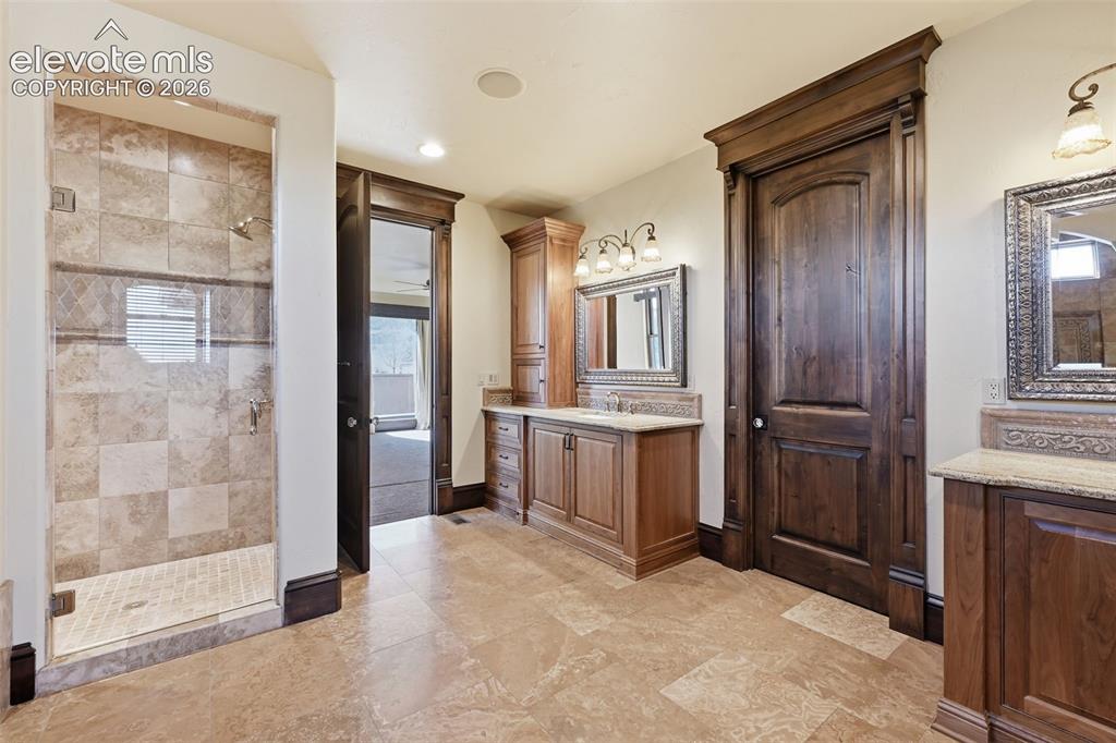 Image 21 of 49: Primary, walk in shower.