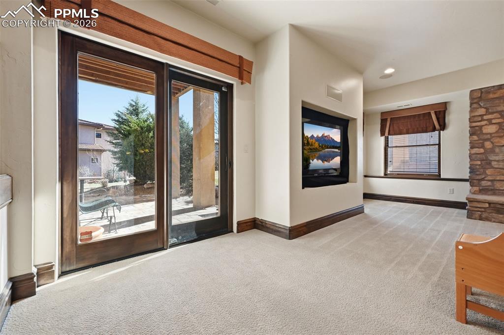 Image 41 of 49: Interior slider to courtyard.