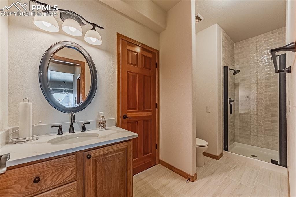 Image 20 of 45: Office Bathroom off of entry