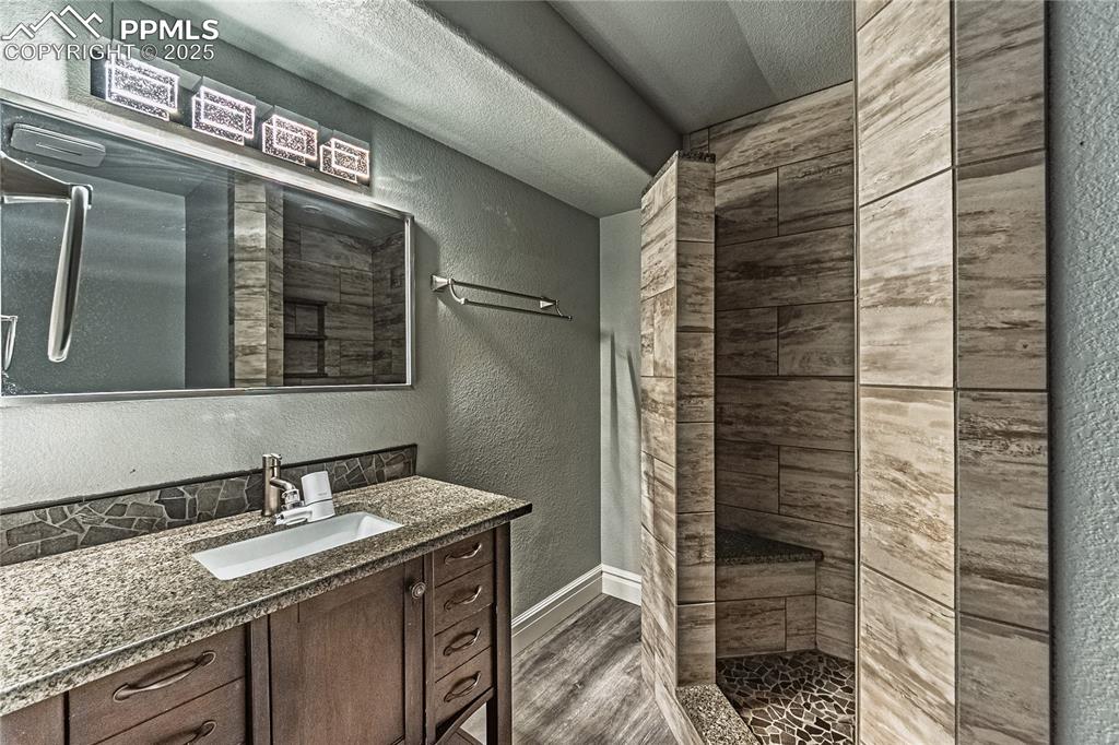 Image 44 of 45: Renovated lower level bathroom