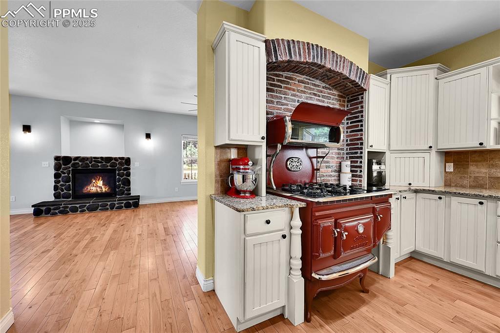 Image 17 of 50: look at that beautiful stove