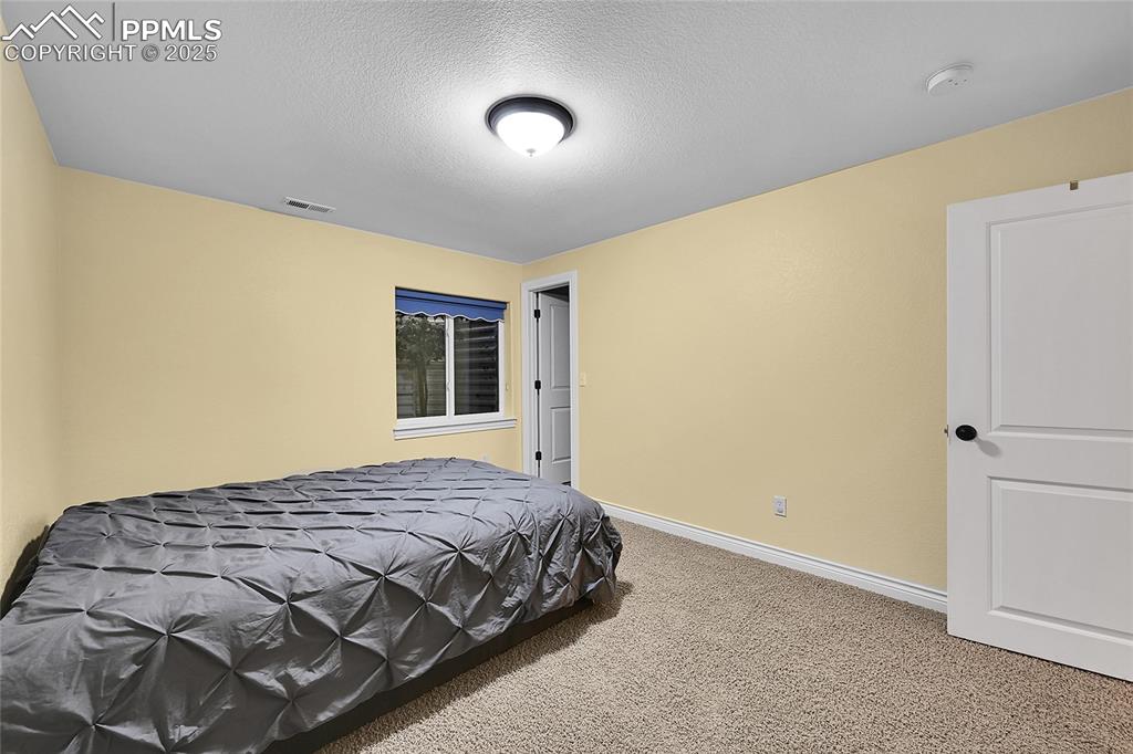 Image 37 of 50: 7th bedroom