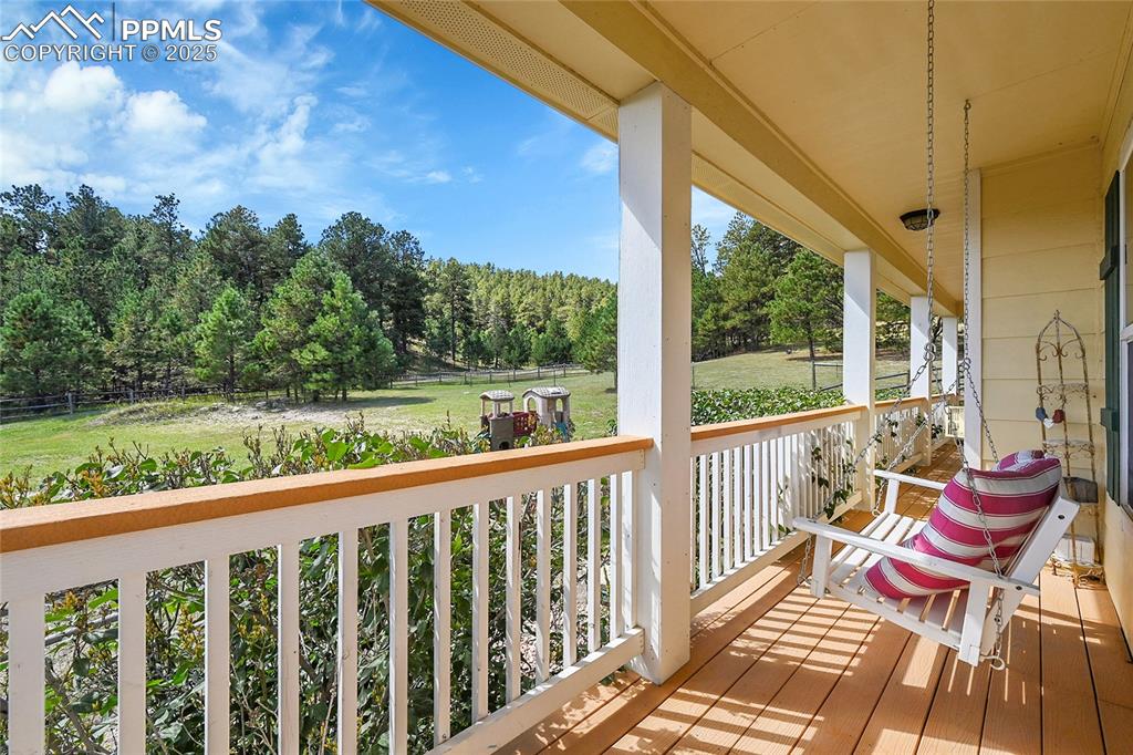 Image 9 of 50: wrap around porch