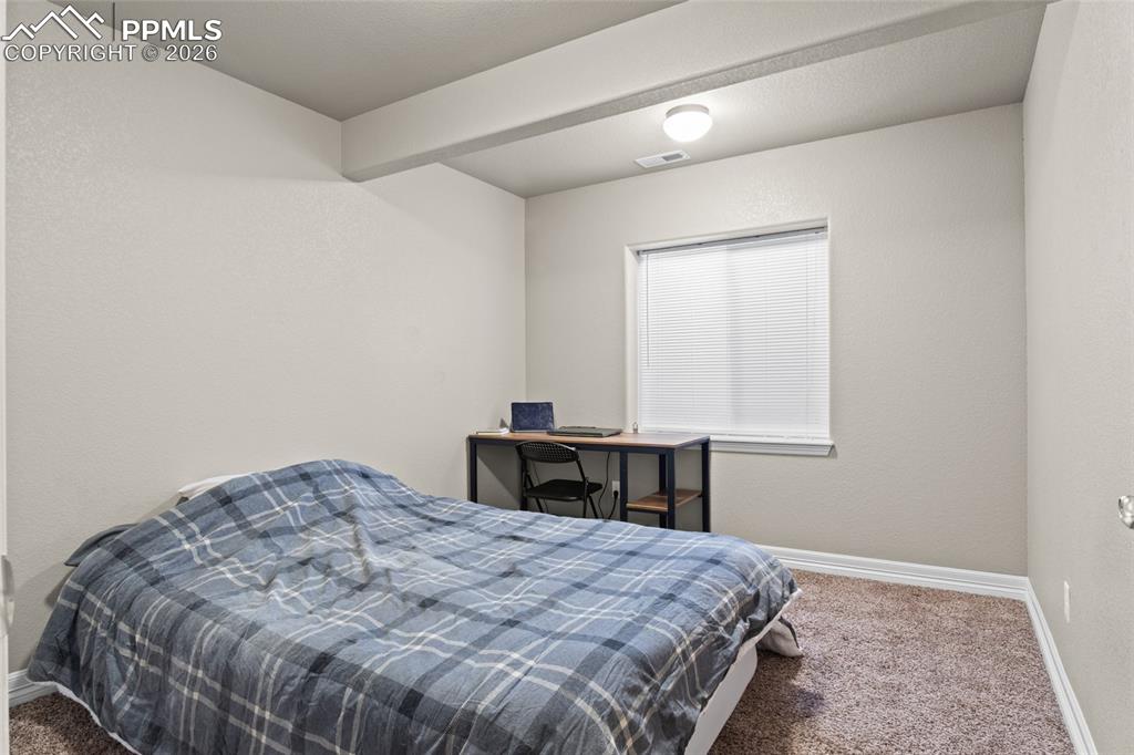 Image 21 of 33: Bedroom