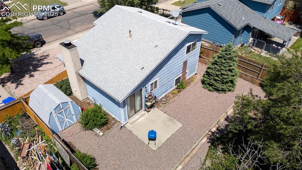Image 24 of 25: Aerial view of property and surrounding area