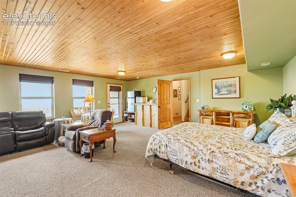Image 35 of 50: Bedroom 2/ In-law suite on lower level with en suite 3/4 bathroom, a large