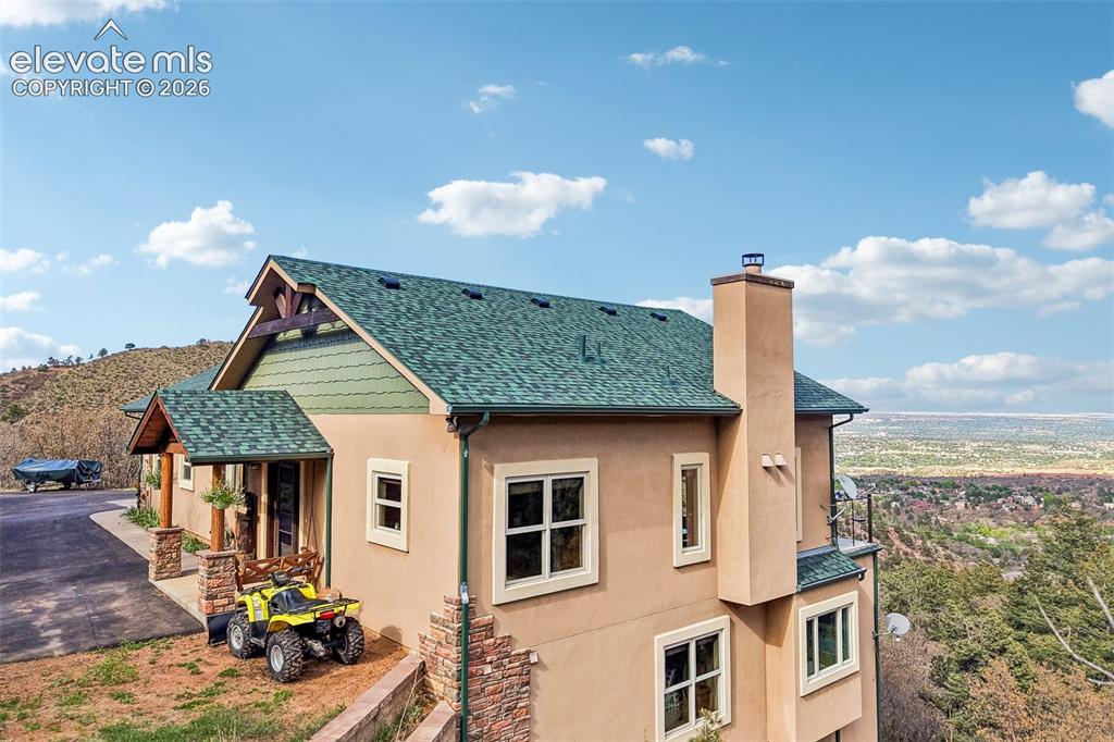 Image 4 of 50: Front of this immaculate mountain home. Just look at those views!!!