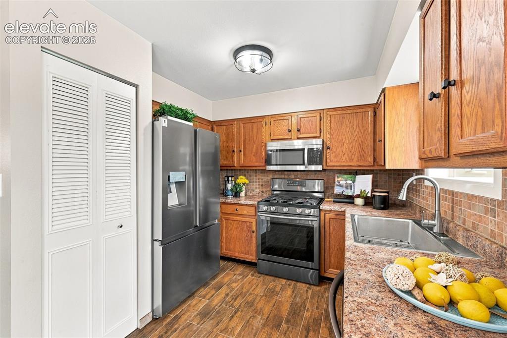 Image 13 of 33: View with pantry dors in view