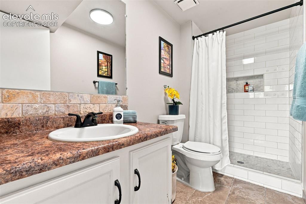 Image 19 of 33: Updated 3/4 bath in lower level