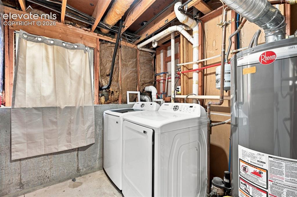 Image 20 of 33: Laundry Room in Lower Level Washer and Dryer remain. New Furnace, Water Hea