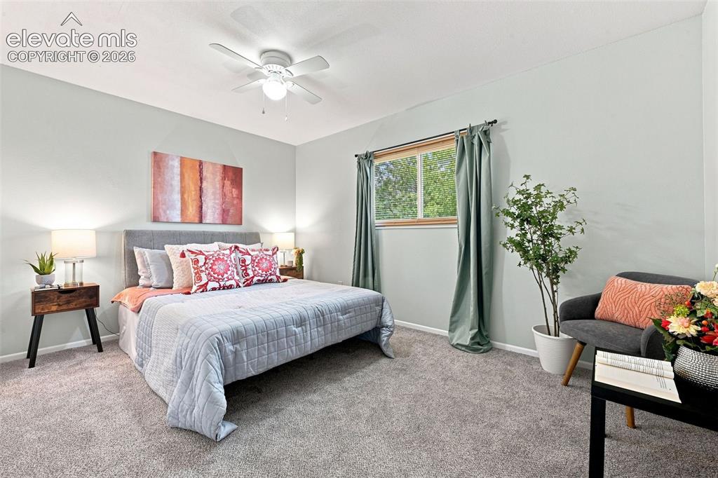 Image 5 of 33: Upper Level Primary bedroom with adjoining door to bathroom