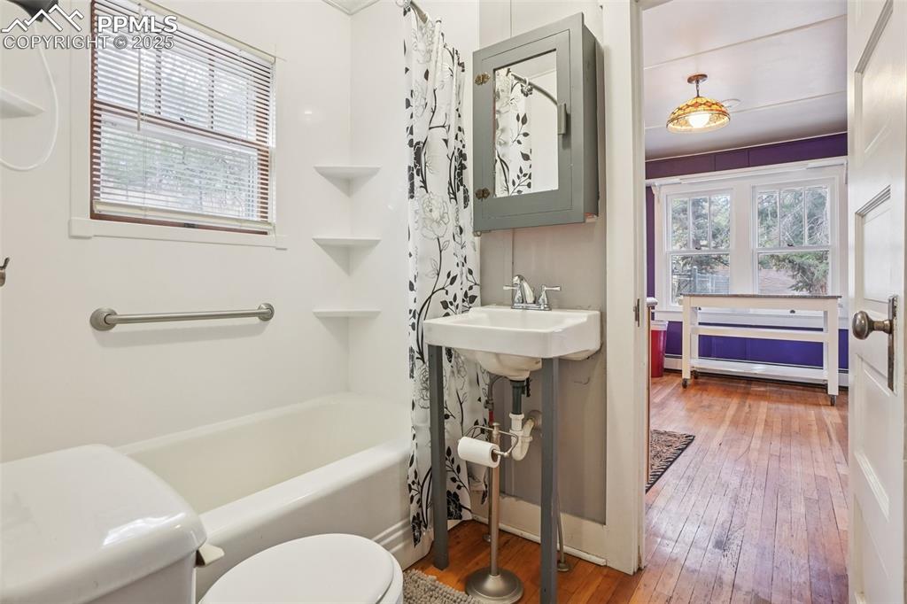 Image 17 of 43: Bathroom off kitchen and bedroom 3