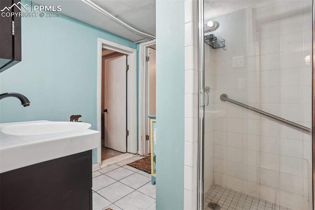 Image 36 of 43: 3/4 bathroom on the lower level