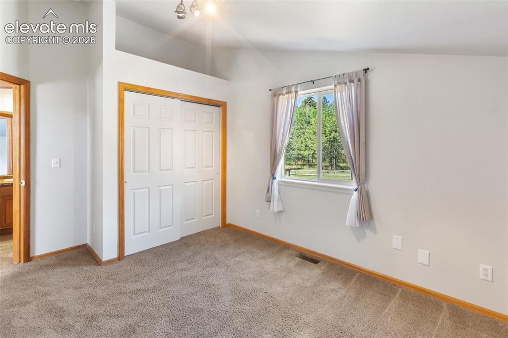 Image 18 of 33: Virtually Staged Entertainment Room