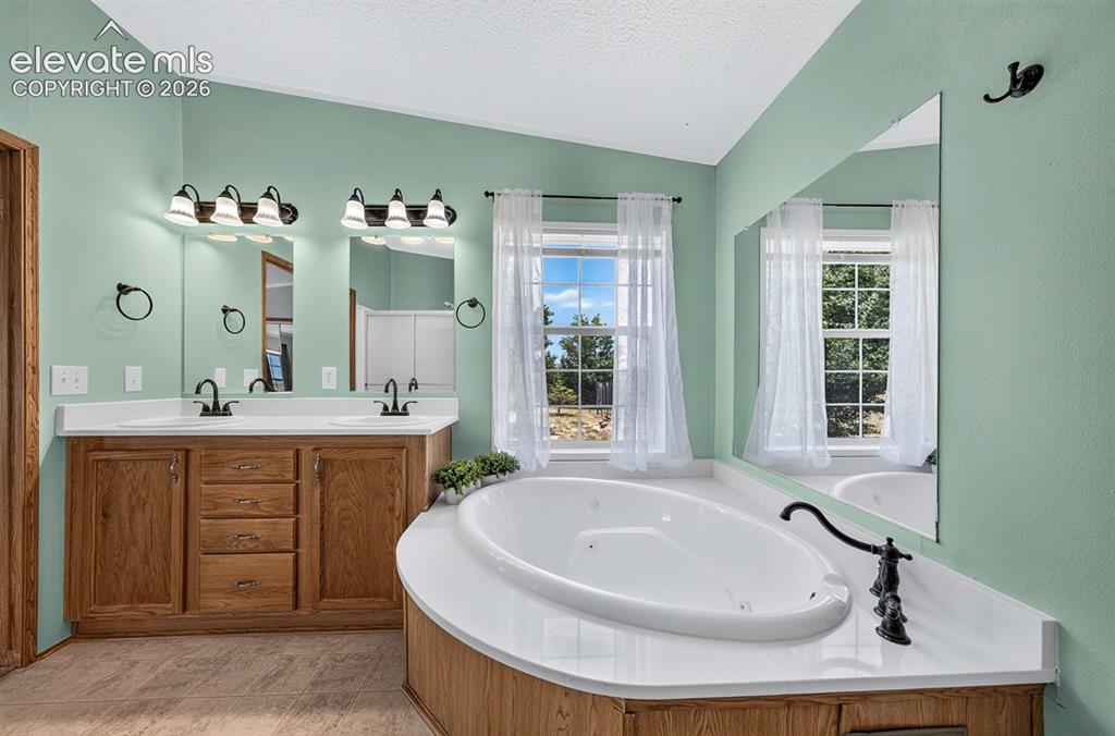 Image 18 of 50: Master Bathroom