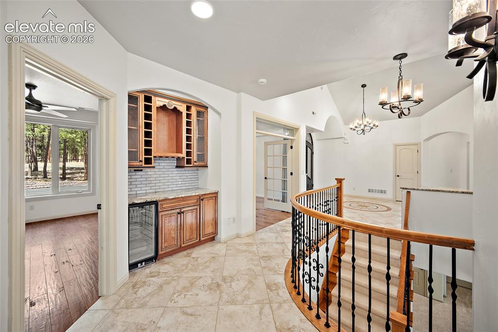 Image 10 of 42: Wine rack, storage & fridge