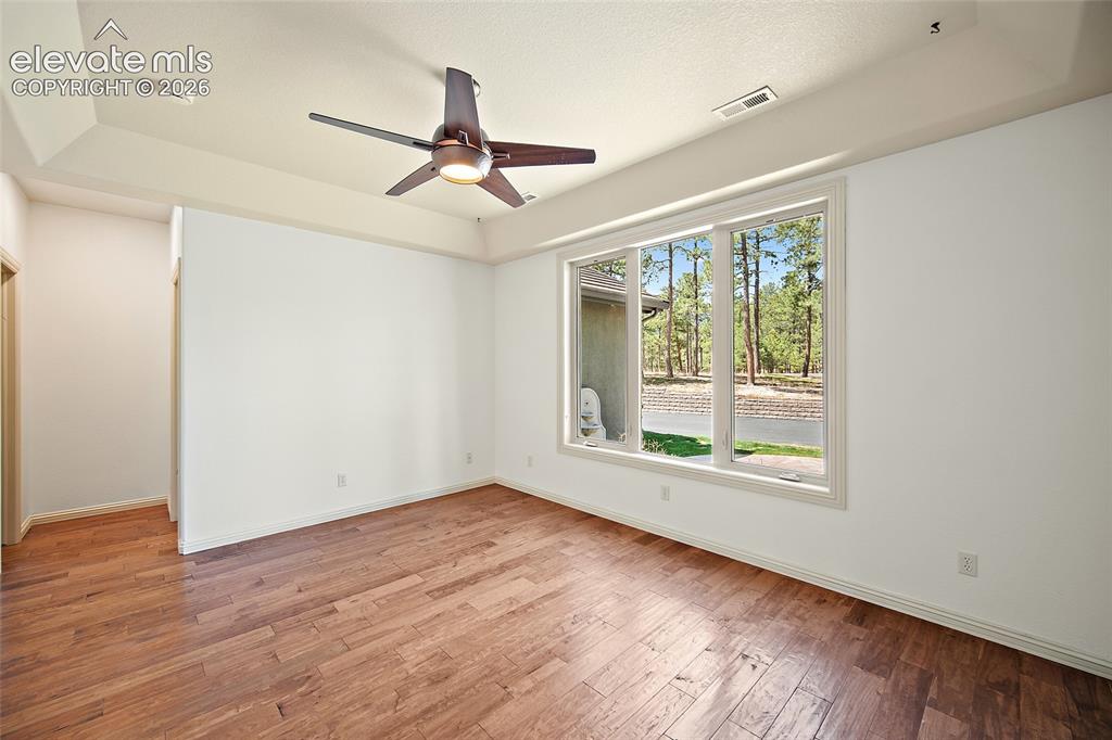 Image 18 of 42: Second bedroom on main level
