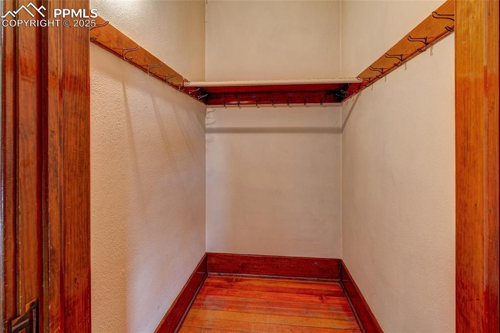 Image 24 of 37: Walk-in closet for primary bedroom
